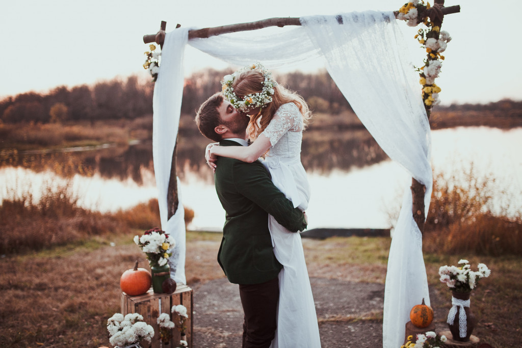beautiful outdoor wedding groom kissing bride